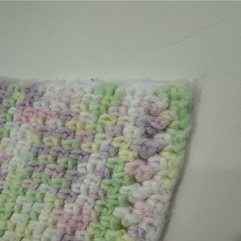 Hand knitted baby blanket, pastel colors.  33 inches by 50 inches. - Picture 4 of 7